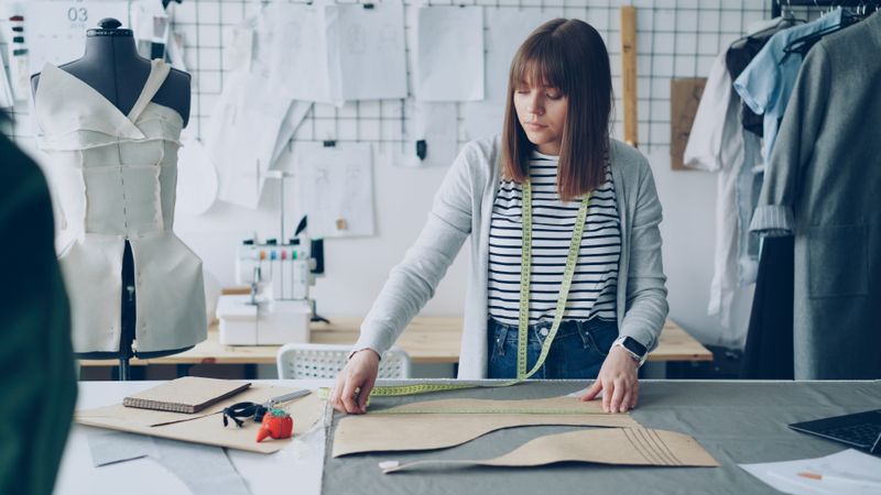 Designer at work crafting premium fashion